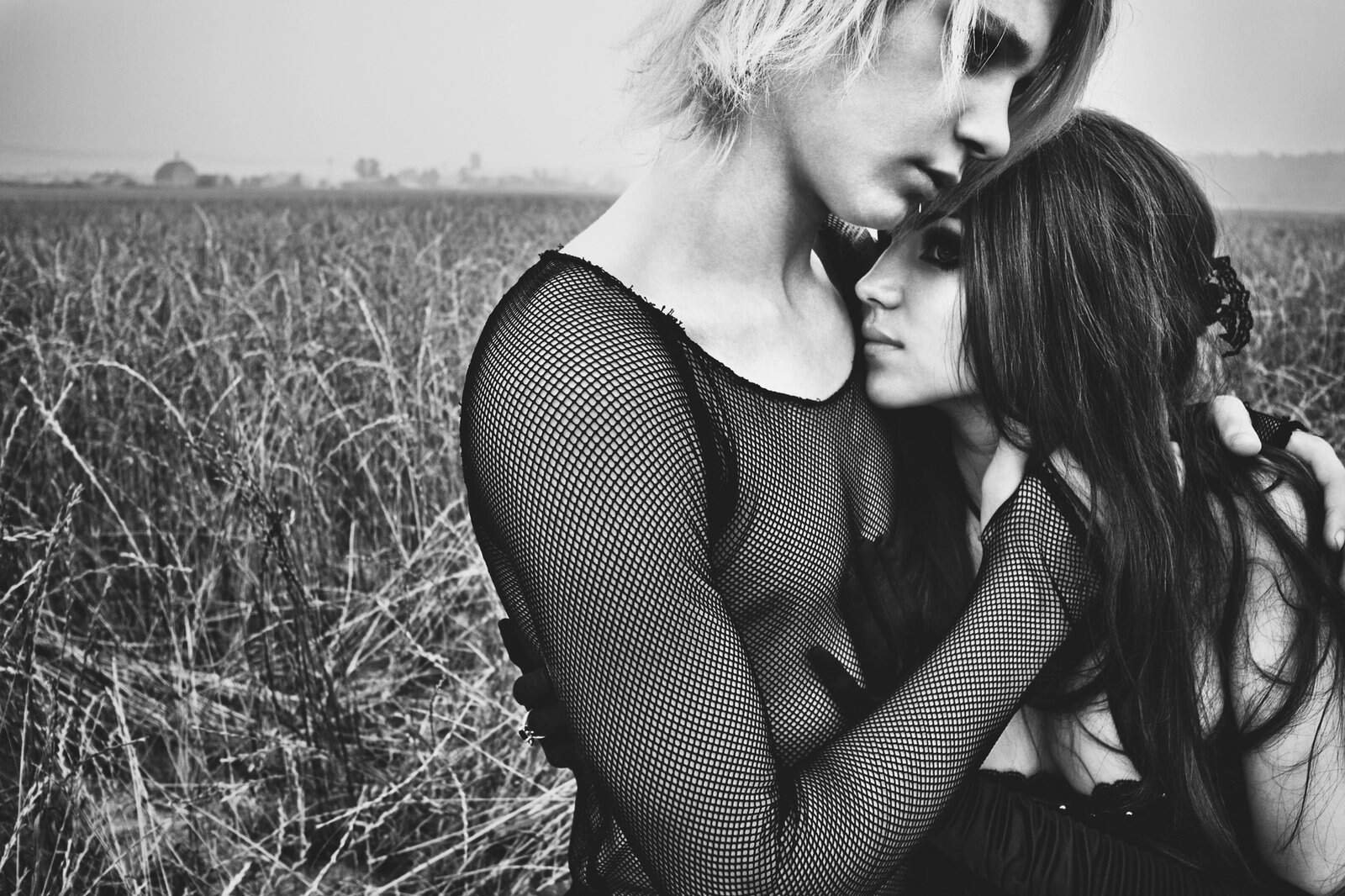 Goth boy, goth girl, hugging in a field, black and white, boy, girl, goth